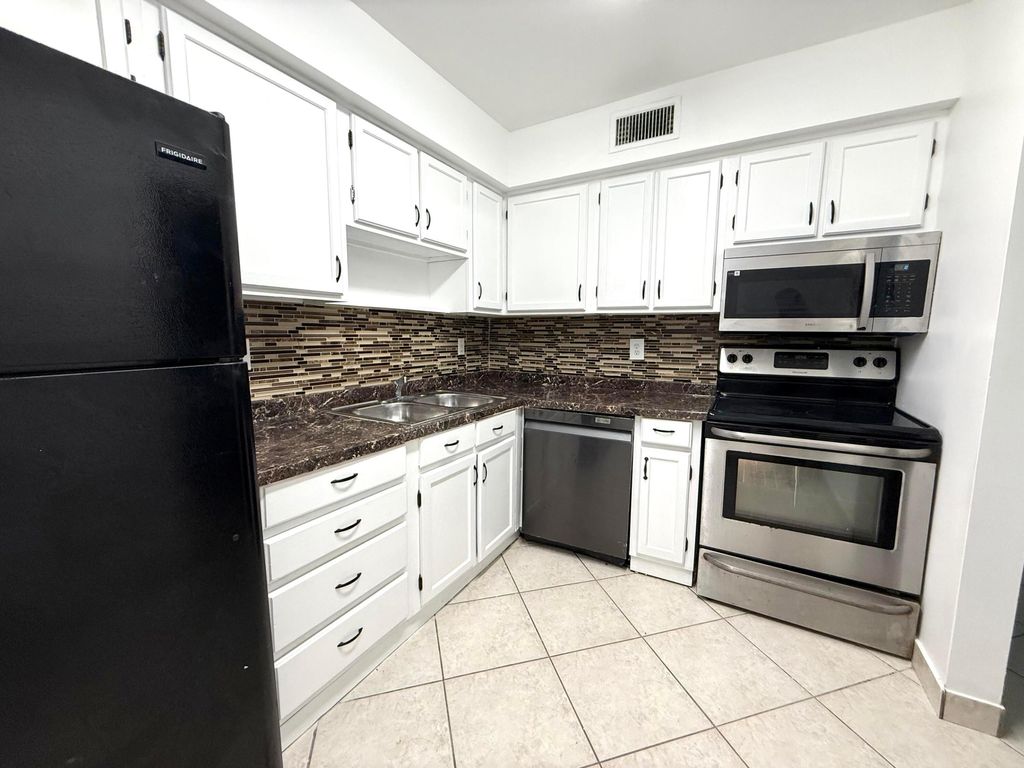 Photo of 9935 Pineapple Tree Drive #Apt 208, Boynton Beach, FL 33436 (MLS # B26034840)