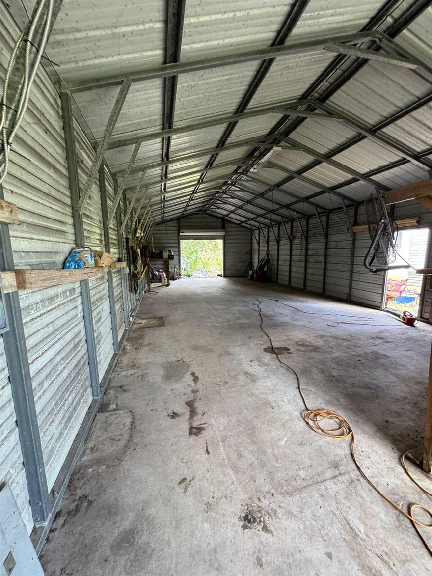 2 separated warehouse storage ,small one with 1000 sf and the bigger one with 2500 sf both METAL/WOOD/STEEL built on 2007,    your own private Oasis ,9 acres of lush undeveloped land just a few miles from the excitement of Wellington Polo Club (a little over 8 miles away ) ,you can build your dream estate complete with riding arenas, stables, or simply a peaceful retreat among the Florida sun and swaying palms trees.