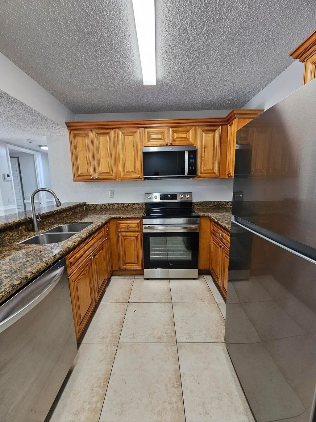 Photo of 1401 Windorah Way #G, West Palm Beach, FL 33411 (MLS # B26023337)