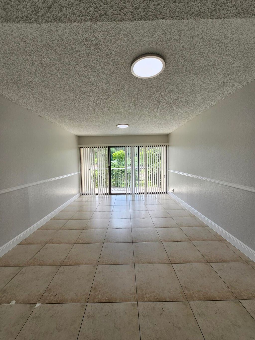 Photo of 1401 Windorah Way #G, West Palm Beach, FL 33411 (MLS # B26023337)