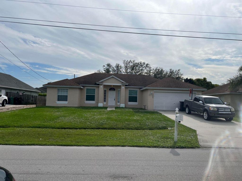 Photo of 1206 SW Medina Avenue, Port St Lucie, FL 34953 (MLS # R10858809)