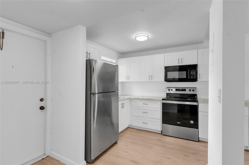 Photo of 9601 Sunrise Lakes Boulevard #106, Sunrise, FL 33322 (MLS # A12026267)
