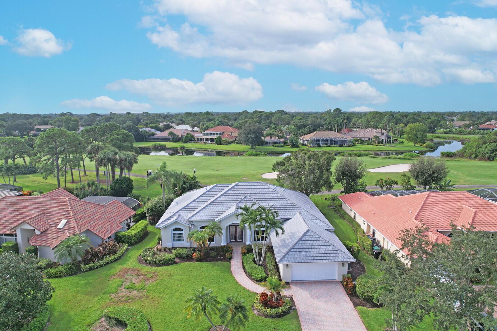 Situated on the golf course in sought-after Country Club Estates, this 4-bedroom, 3-bath home offers great potential with key updates already completed. Enjoy peace of mind with a brand-new roof and hurricane shutters. Fresh paint inside and out in neutral hues, high ceilings, lots of windows and an open floor plan filled with natural light. The kitchen has refreshed white cabinets, solid surface countertops and brand-new stainless-steel appliances giving the heart of the home a modern feel. Situated on a spacious lot, screened lanai and pool with scenic golf course views. Though some areas still invite your personal touch, this home is a fantastic opportunity with low HOA fees and a prime location.