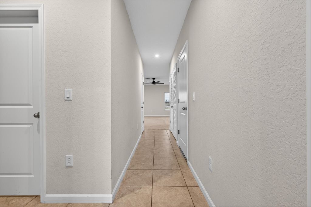 Photo of 136 Dabou Loop, Belle Glade, FL 33430 (MLS # R11146692)