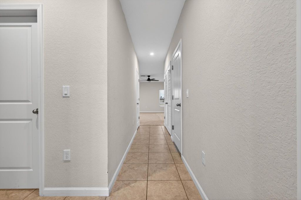 Photo of 136 Dabou Loop, Belle Glade, FL 33430 (MLS # R11146692)