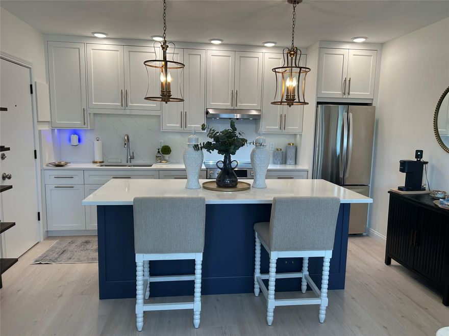 A Most Fabulous Unit that has been beautifully remodeled with High-Quality upgrades-All new Cabinets, Stainless Steel appliances, New light fixtures, Kitchen island, Impact windows, and New window treatments ! Just painted and all the popcorn has been removed ! New Designer luxury vinyl flooring throughout for the Florida Feel ! New AC and More ! This unit has only been lightly used so this is an opportunity for a buyer to move right in ! Georgian Court is the best value in The Imperial Point Neighborhood-Immaculate Grounds and just a short drive to the beach and Lauderdale-by-the sea ! Call for more details !