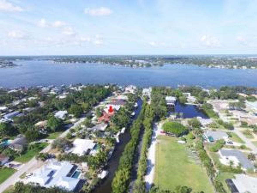 Rare 4 bedroom waterfront home on canal off Loxahatchee River just mins to the inlet.  Half acre lot with privacy in back.  No homes across the canal!  Open floor plan with high ceiling wonderful pool/patio area.  Outdoor shower, cabana bath, lots of green space.  Nice finsihes such as SubZero built in refrigerator and central vac.  BBQ, Green Egg, Floating dock for jet ski only does not convey.  Floating dock for boat and utility dock stay.