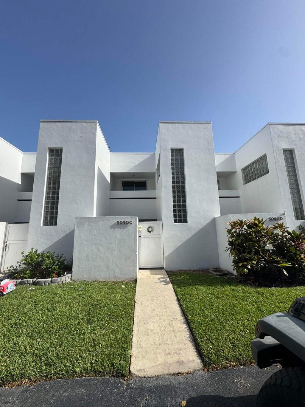Photo of 5090 ELMHURST Road #C, West Palm Beach, FL 33417 (MLS # B26052843)