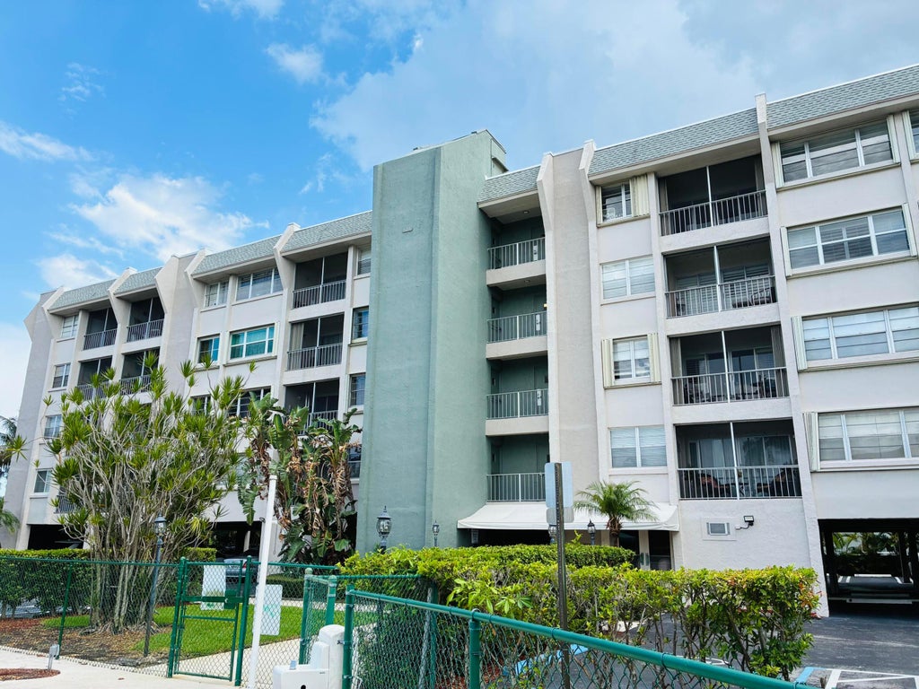 Photo of 505 Spencer Drive NW #112, West Palm Beach, FL 33409 (MLS # B26056657)