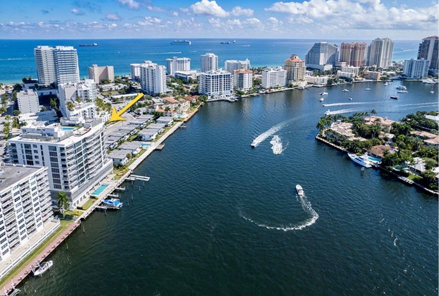 New boat lift (24,000 lbs) 40'x12' boat slip & pool side Cabana. Luxury boutique bldg 31 residences. Flow through unit, 3 bedrooms, ensuite baths, den/office, half bath, 2 terraces, & summer kitchen, flat screen tv, grill, refrigerator, sink, & ice machine on sunset terrace. Custom designed lighting throughout, electric shades, high impact glass, & continuous sound system throughout. Gaggenau GAS cooktop, oven, refrigerator, wine cooler & Bosch dishwasher, Scavolini Italian cabinets & quartz counter tops. Amenities: rooftop pool, with ocean views, sunset pool & private marina, flow through lobby designed by Steven G, state of the art gym & more. 2 garage spaces & 2 pets ok. Close to beach & restaurants.