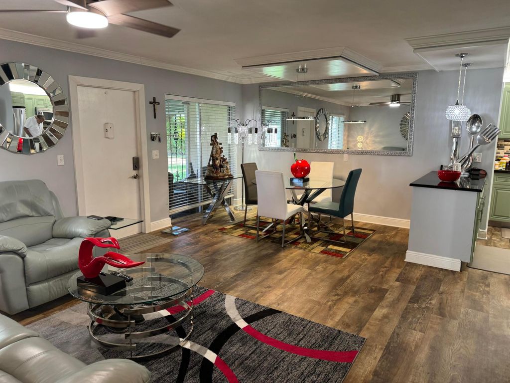 Photo of 5817 La Pinata Boulevard #B-1, Greenacres, FL 33463 (MLS # B26018398)