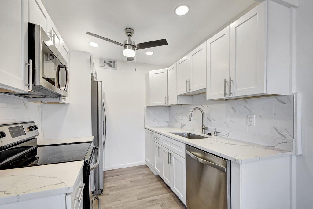 Photo of 4015 Cornwall A, Boca Raton, FL 33434 (MLS # B26022724)