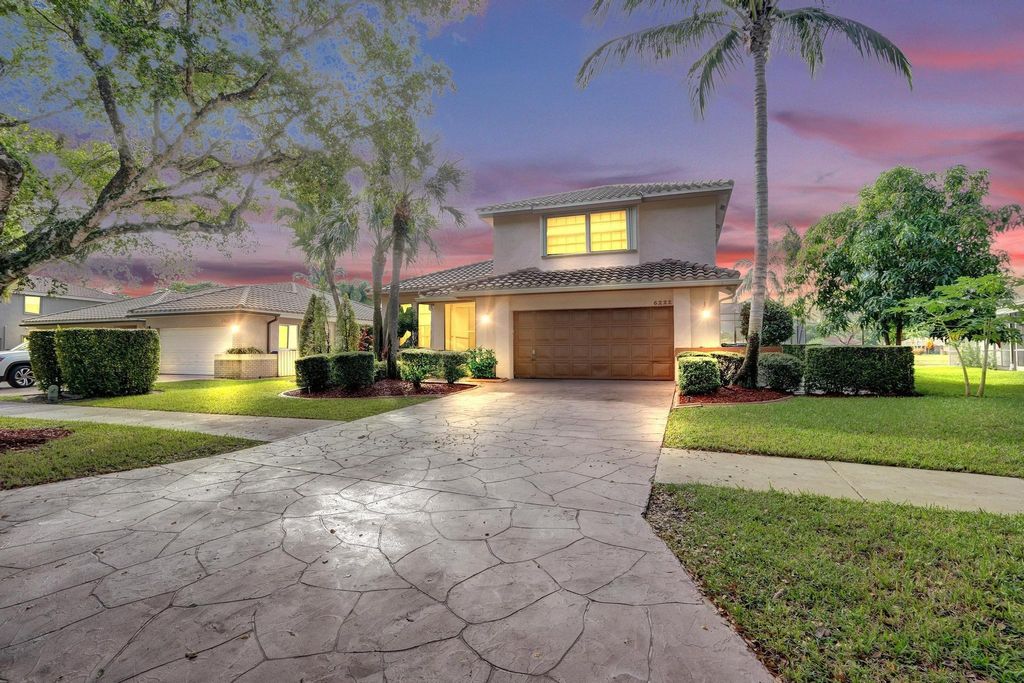 Photo of 6222 NW 54th Dr, Coral Springs, FL 33067 (MLS # F10533123)