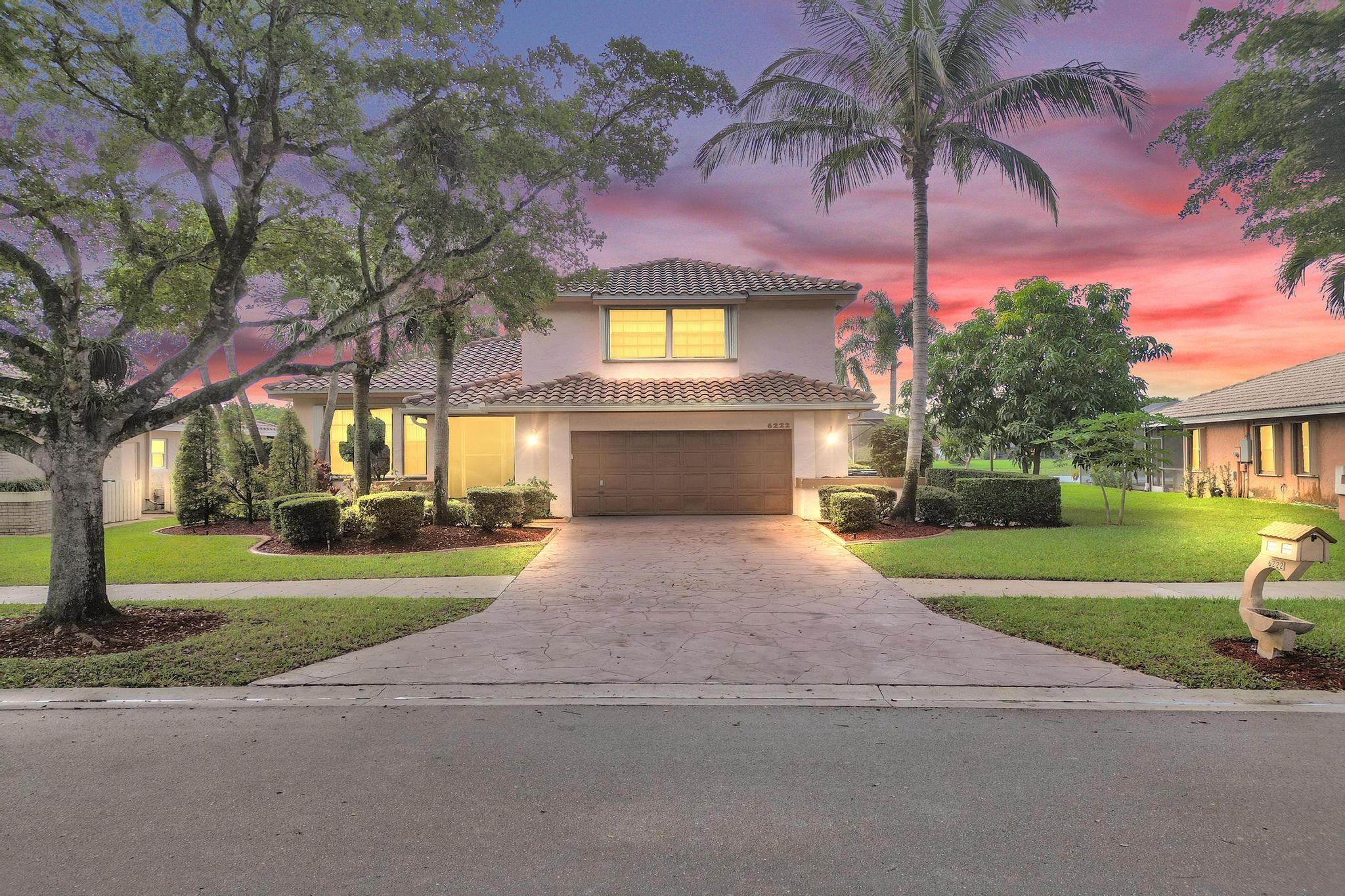 Welcome Home! This 4 Bedroom 3 Bathroom 2 Story Pool Home on Gorgeous Lakefront In The Desirable Hidden Hammocks Community In Coral Springs. Interior Features Include Upgraded Kitchen With Wood Cabinets and Granite Countertops, Italian Marble Flooring On First Floor, Wood Laminate Flooring Upstairs. Newer Roof and 2 AC Units. Spacious Primary Bedroom With Large Balcony Overlooking Waterview, Spacious Walk In Closet, Upgraded Primary Bathroom With Extra Storage. Exterior Features Include Pool With Spa, Screened In Patio, Wide Water View, Hurricane Shutters, Screened In Entryway With Exterior Double Doors. Close To Shopping, LOW HOA, Must See!!