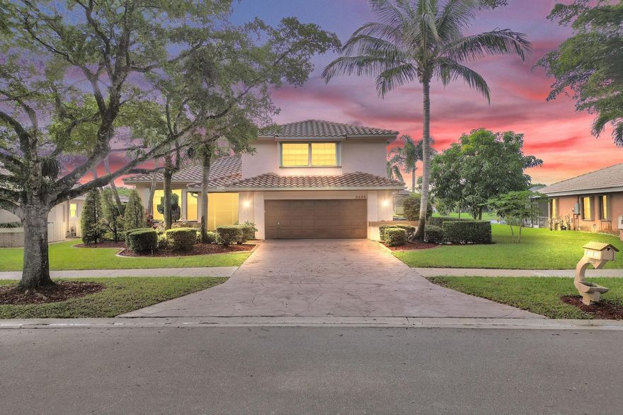 Welcome Home! This 4 Bedroom 3 Bathroom 2 Story Pool Home on Gorgeous Lakefront In The Desirable Hidden Hammocks Community In Coral Springs. Interior Features Include Upgraded Kitchen With Wood Cabinets and Granite Countertops, Italian Marble Flooring On First Floor, Wood Laminate Flooring Upstairs. Newer Roof and 2 AC Units. Spacious Primary Bedroom With Large Balcony Overlooking Waterview, Spacious Walk In Closet, Upgraded Primary Bathroom With Extra Storage. Exterior Features Include Pool With Spa, Screened In Patio, Wide Water View, Hurricane Shutters, Screened In Entryway With Exterior Double Doors. Close To Shopping, LOW HOA, Must See!!