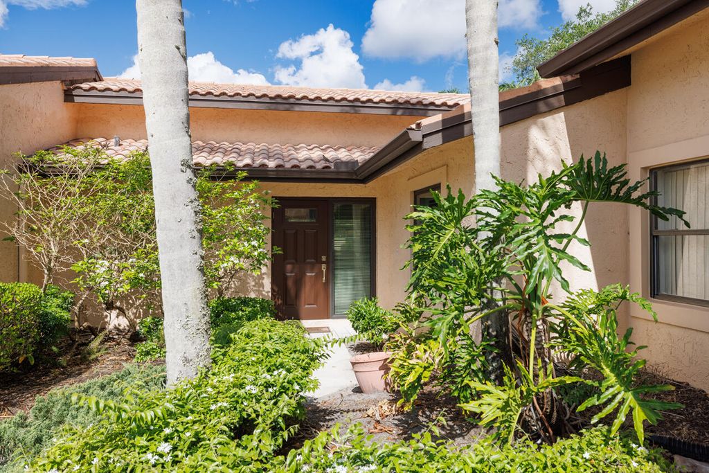 Photo of 3545 SW Quail Meadow Trail #E, Palm City, FL 34990 (MLS # B26008492)