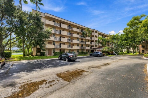Photo of 2768 CARAMBOLA Circle S #302, Coconut Creek, FL 33066 (MLS # B26090824)