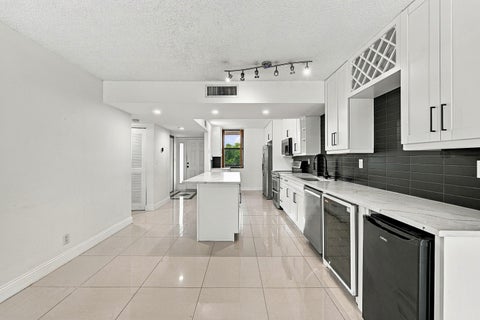 Tiny photo for 2768 CARAMBOLA Circle S #302, Coconut Creek, FL 33066 (MLS # B26090824)