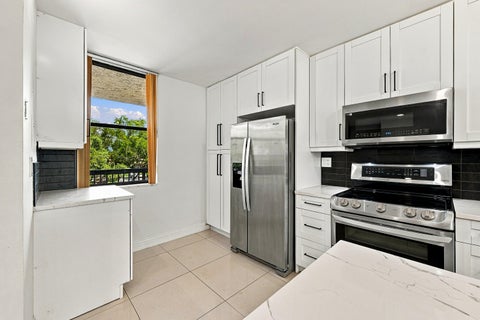 Tiny photo for 2768 CARAMBOLA Circle S #302, Coconut Creek, FL 33066 (MLS # B26090824)
