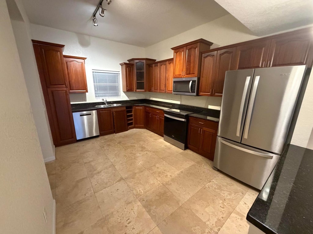 Photo of 1640 PRESIDENTIAL Way #307, West Palm Beach, FL 33401 (MLS # B26077851)