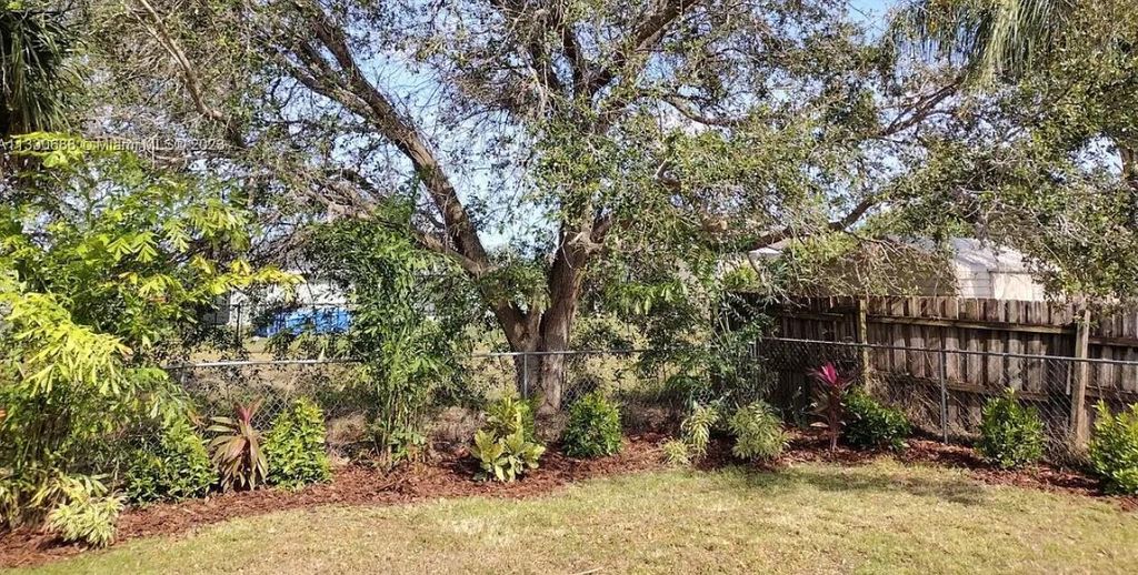 Photo of 841 NW Riverside Drive, Port Saint Lucie, FL 34983 (MLS # R11168261)