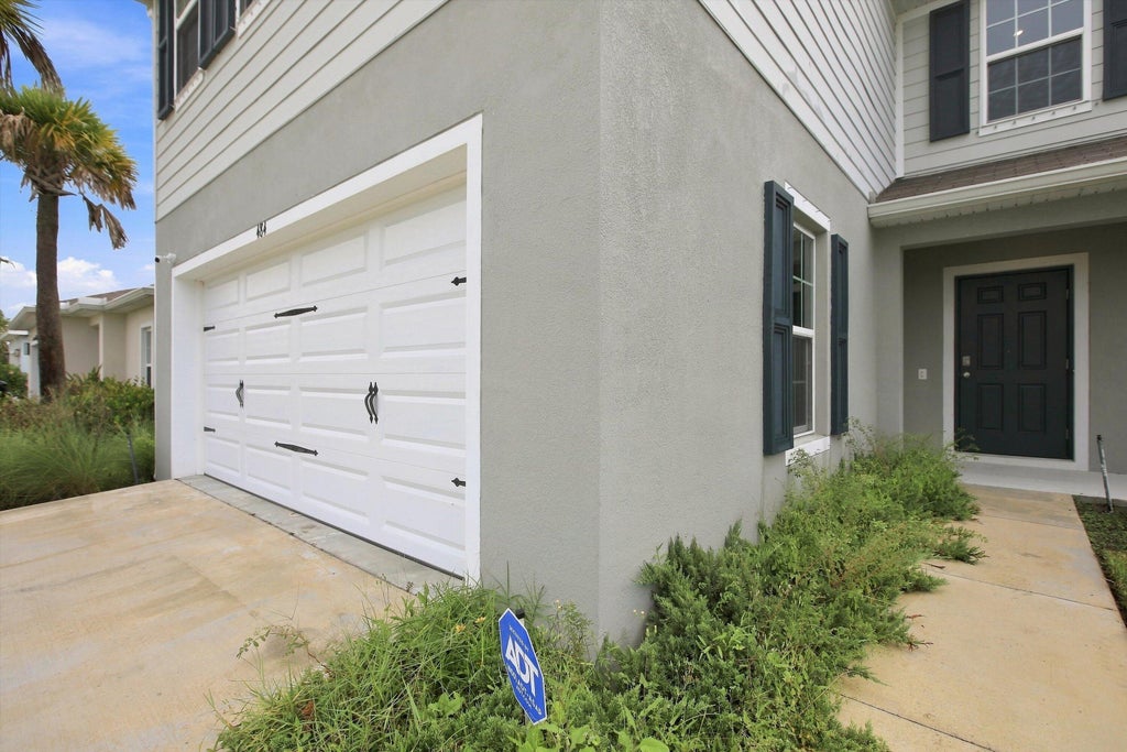 Photo of 484 CHERIMOYA Street, Fort Pierce, FL 34981 (MLS # B26063647)