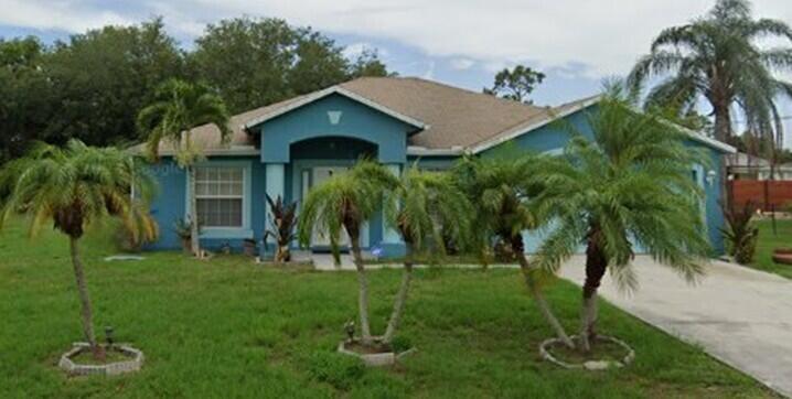 Call today for this nice three-bedroom two bath home in Port St. Lucie, FL. This home has Tile and carpet throughout. Ceiling fans in all rooms. Rare opportunity to purchase this one-owner, meticulously maintained home in one of the area's most sought-after neighborhoods. This spacious one-story residence offers additional highlights include an oversized two-car garage and an expansive Family room with sliding doors that leads out to the patio with year-round enjoyment of the outdoor setting.