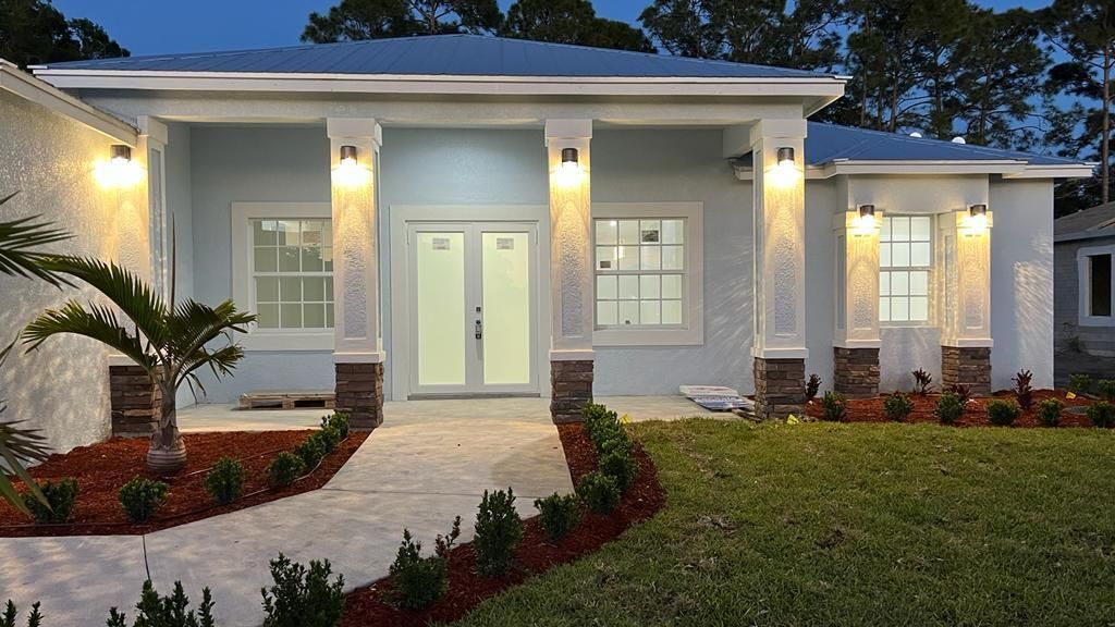 Photo of 1815 SW Certosa Road, Port Saint Lucie, FL 34953 (MLS # R10790696)