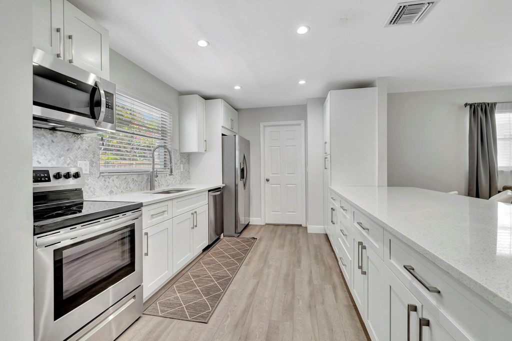 Photo of 1617 NW 4th Street, Boca Raton, FL 33486 (MLS # F10458088)