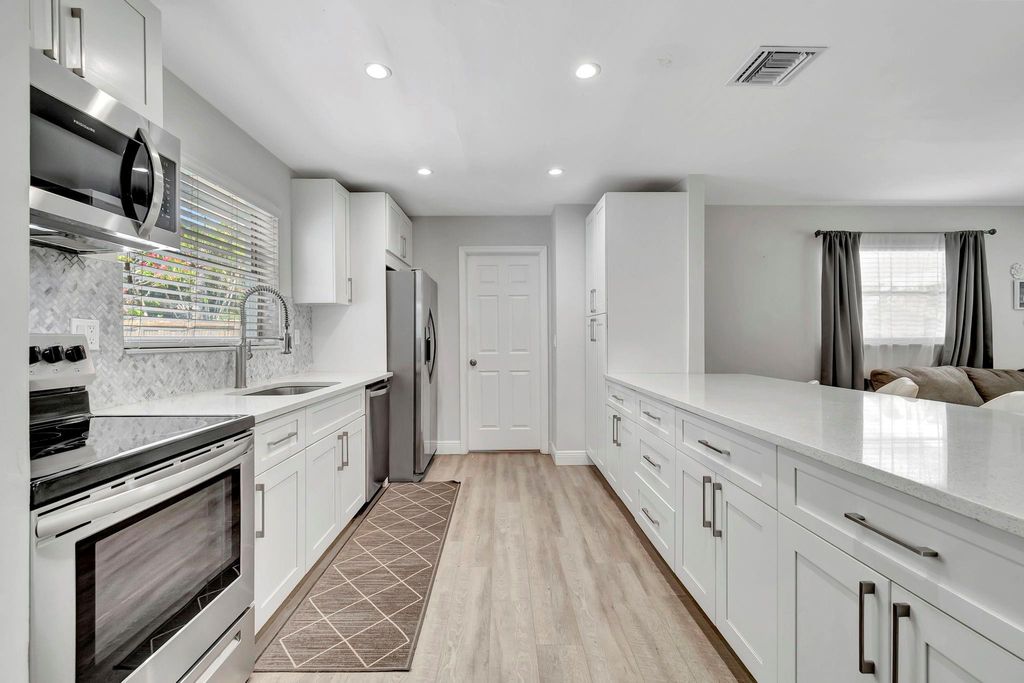 Photo of 1617 NW 4th Street, Boca Raton, FL 33486 (MLS # F10458088)