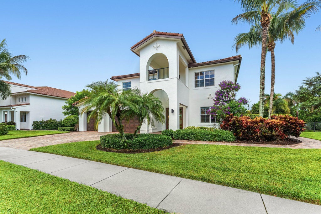 Photo of 141 UMBRELLA Place, Jupiter, FL 33458 (MLS # B26069476)