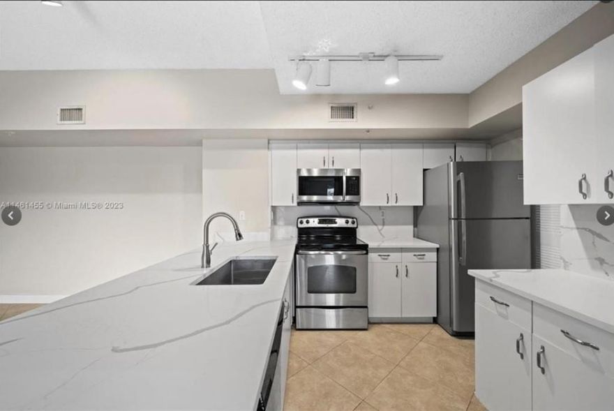 Fast Association Approval, Gated Community, Freshly painted, Spacious, Full kitchen w/ ample cabinet space. Vaulted high ceilings! Porcelain tiles throughout the apartment. 2 Large bedrooms and 2 bathrooms. Master bedroom has walk in closet and guest bedroom has two closets. Centrally located to Promenade outdoor mall, trade wind park, Florida turnpike, Sawgrass express way, Casino and shopping. Great schools and club house amenities