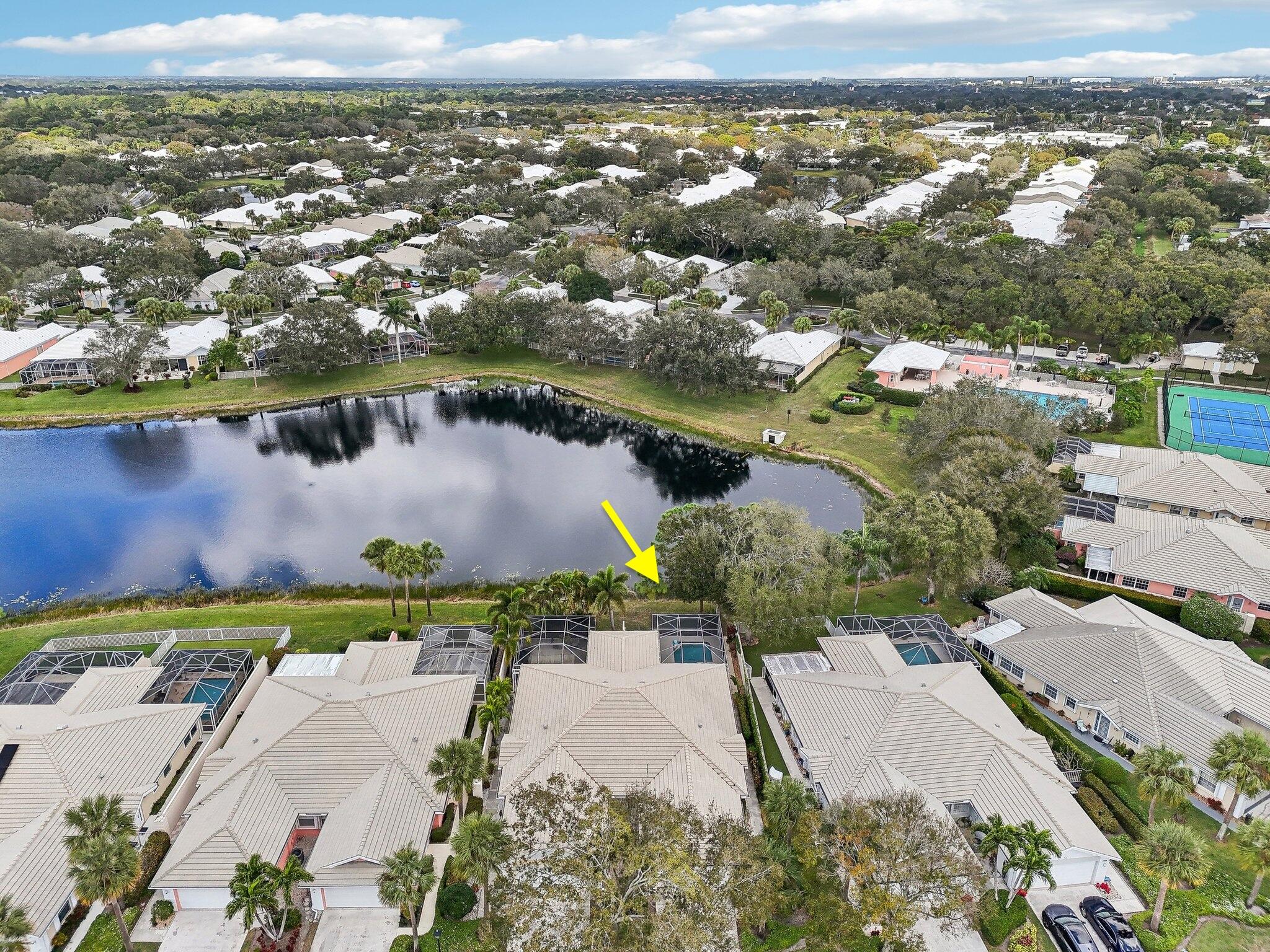 Welcome to your single-story Pool home overlooking the Lake! Offering peace of mind with major improvements *2024 impact windows *2024 full home re-pipe (no polybutylene)*2024 washer/dryer *2023 water heater *2021 AC *new garage door motor *carpet installed 2025 in primary bedroom and main living areas.