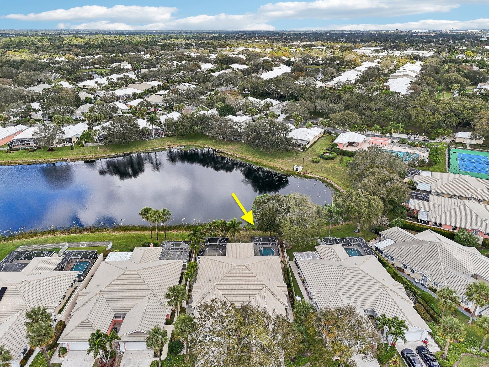 Welcome to your single-story Pool home overlooking the Lake! Offering peace of mind with major improvements *2024 impact windows *2024 full home re-pipe (no polybutylene)*2024 washer/dryer *2023 water heater *2021 AC *new garage door motor *carpet installed 2025 in primary bedroom and main living areas.