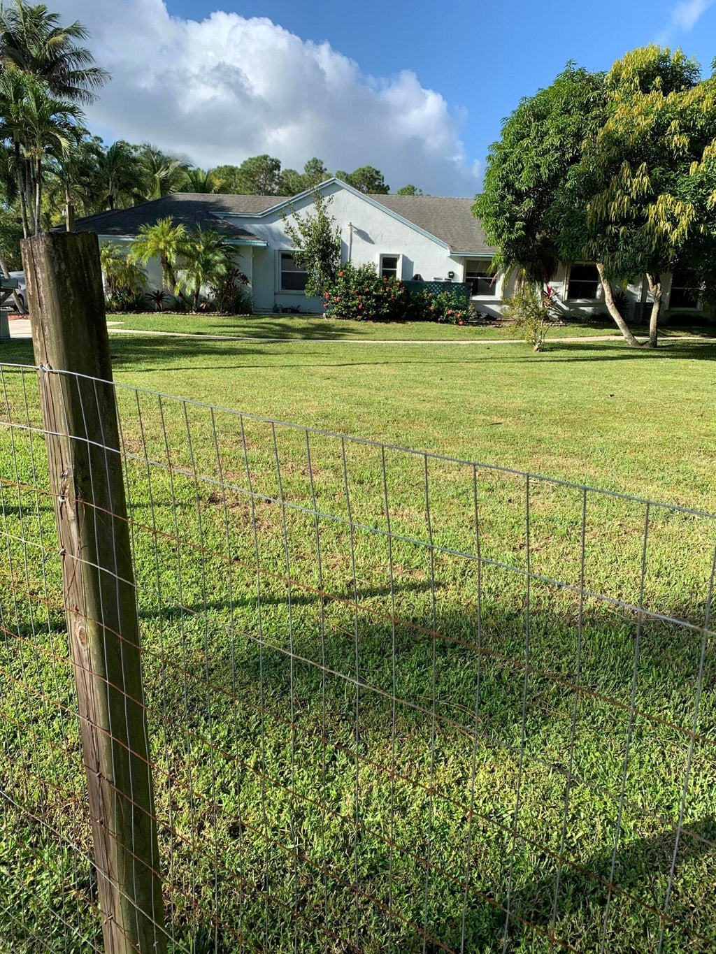 Photo of 7023 Banyan Boulevard #One, Loxahatchee, FL 33470 (MLS # B26091342)