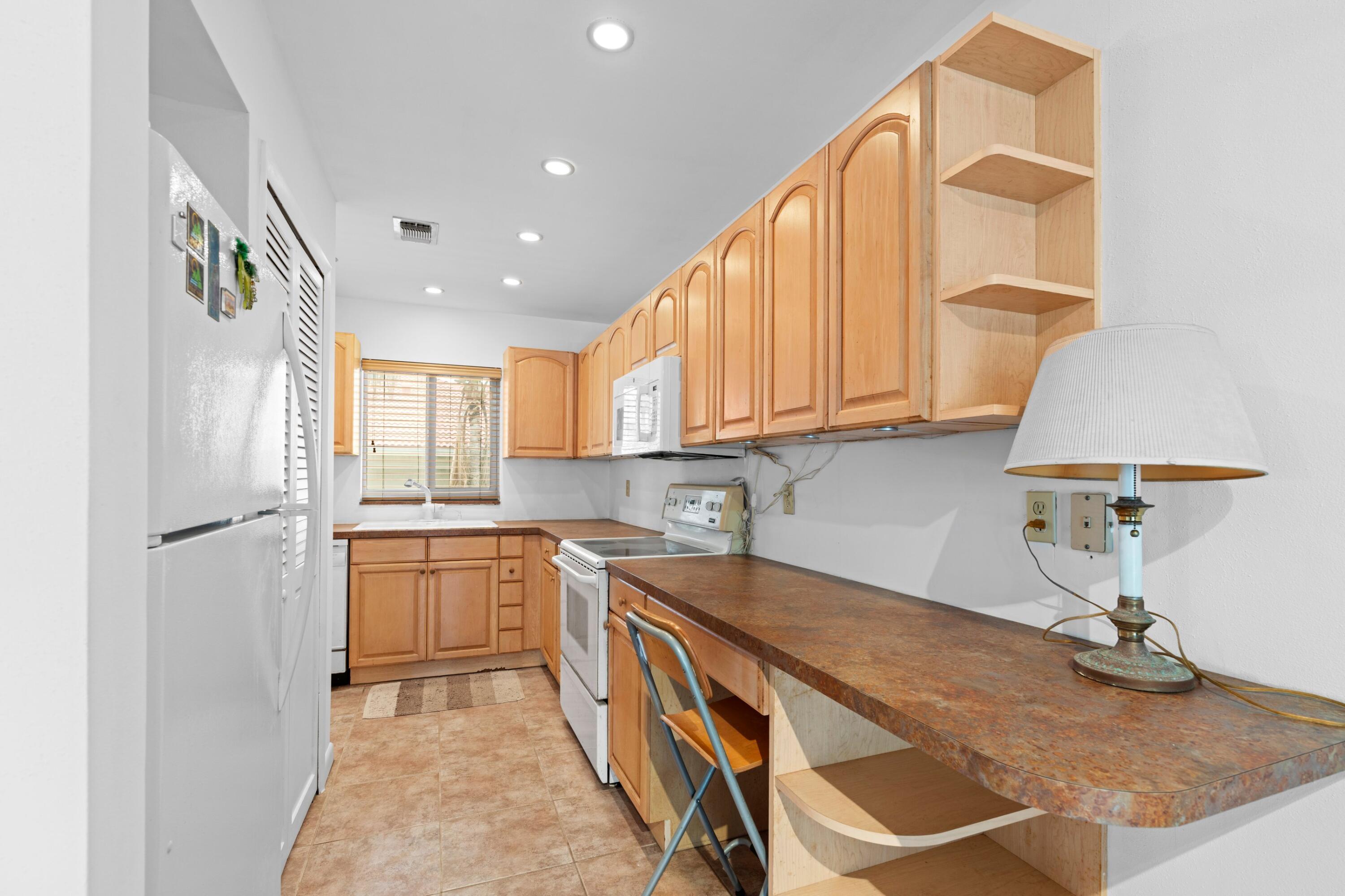 BOCA CAPRI CONDO APTS SLY 218 FT OF ELY - Residential