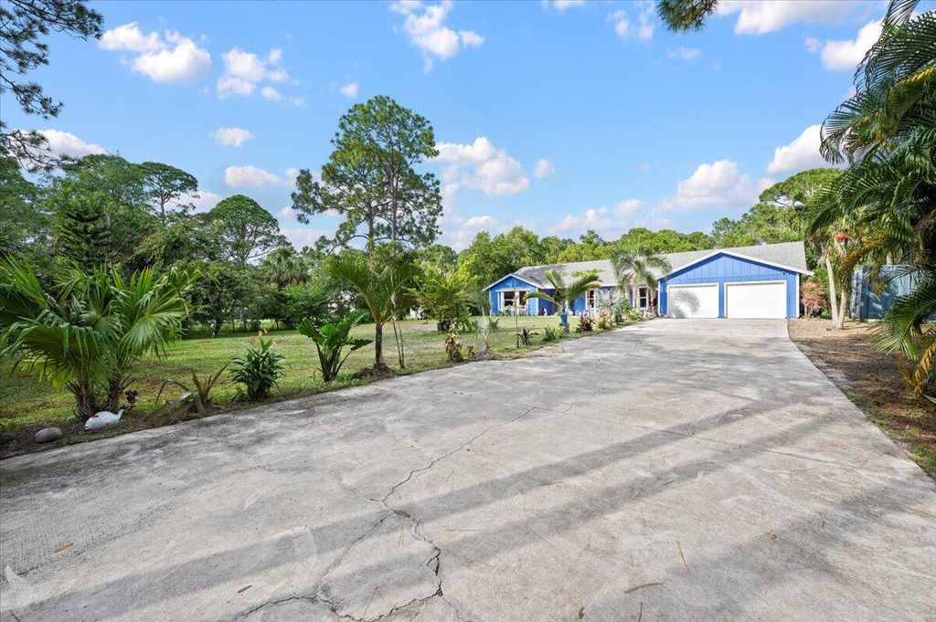 Photo of 10735 157th Street N, Jupiter, FL 33478 (MLS # R10940829)