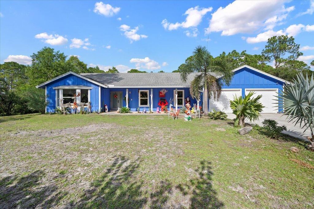 Photo of 10735 157th Street N, Jupiter, FL 33478 (MLS # R10940829)