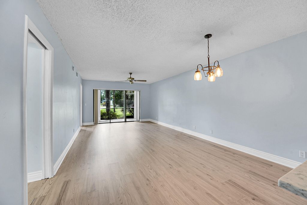 Photo of 2301 Sabal Ridge Court #A, Palm Beach Gardens, FL 33418 (MLS # R11077978)