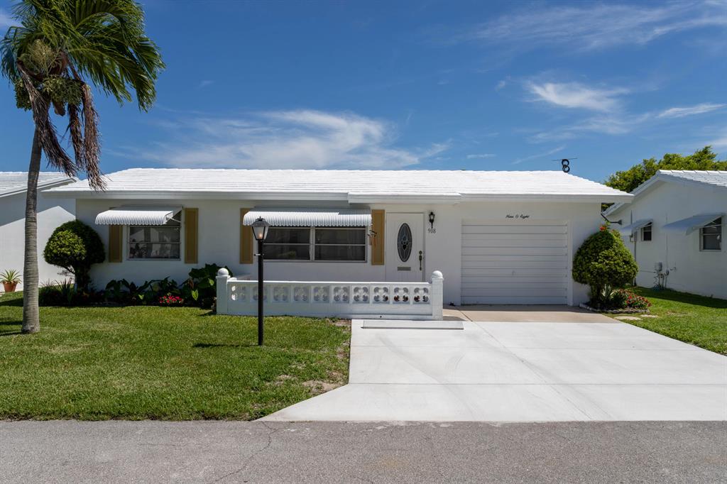 This lovely home in the 55+ community of Palm Beach Leisureville is tastefully updated. Engineered hardwood floors welcome you as you enter the main living area and large kitchen peninsula is perfect for entertaining. Other features include a 1-car garage, open living/dining area, Florida room, two spacious bedrooms, 2 bathrooms with walk-in showers, and spacious patios in the front and back. Palm Beach Leisureville is an active adult community with organized events as well as a clubhouse with a pool, event area, shuffleboard and golf. Conveniently located near I-95, shopping, dining, and movies.