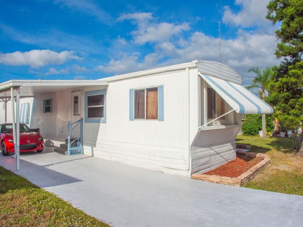 Photo of 10 Desoto Lane, Port Saint Lucie, FL 34952 (MLS # R11141825)