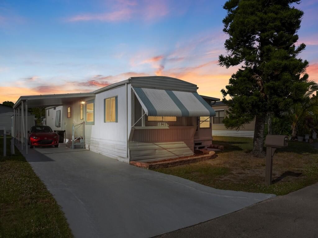 Photo of 10 Desoto Lane, Port Saint Lucie, FL 34952 (MLS # R11141825)