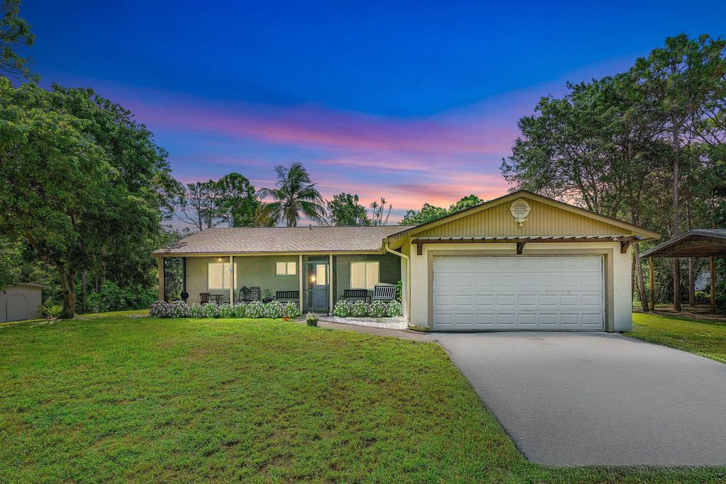 Photo of 12752 Key Lime Boulevard, West Palm Beach, FL 33412 (MLS # R11132999)