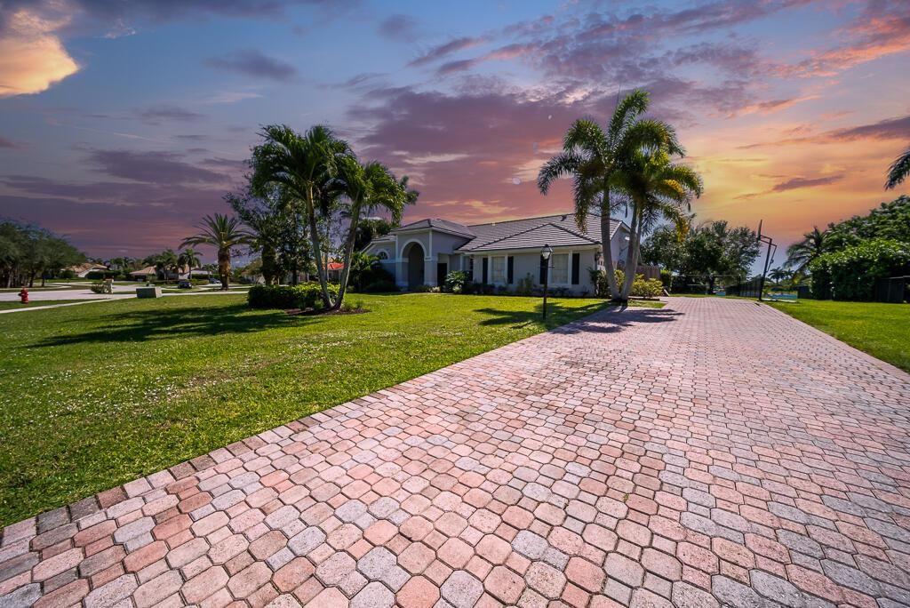 Photo of 9640 Eagle Point Lane, Lake Worth, FL 33467 (MLS # R11092192)