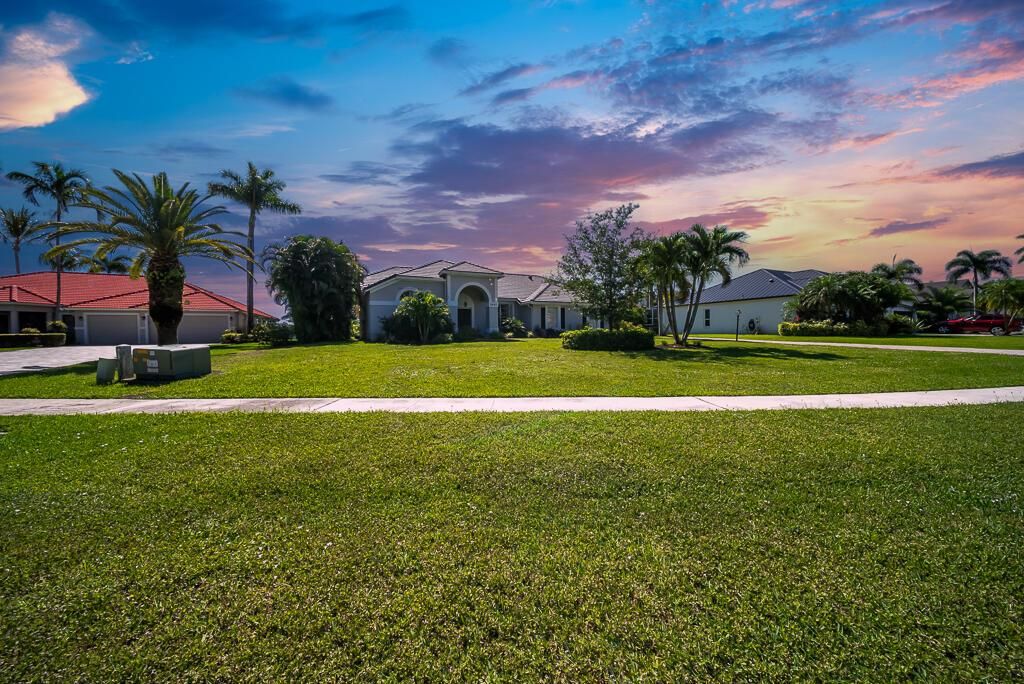 Photo of 9640 Eagle Point Lane, Lake Worth, FL 33467 (MLS # R11092192)