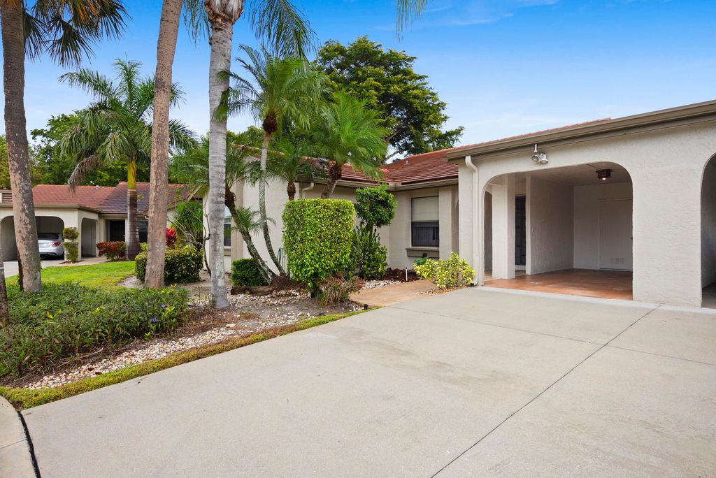 Photo of 5860 Forest Grove Drive #1, Boynton Beach, FL 33437 (MLS # R11157350)