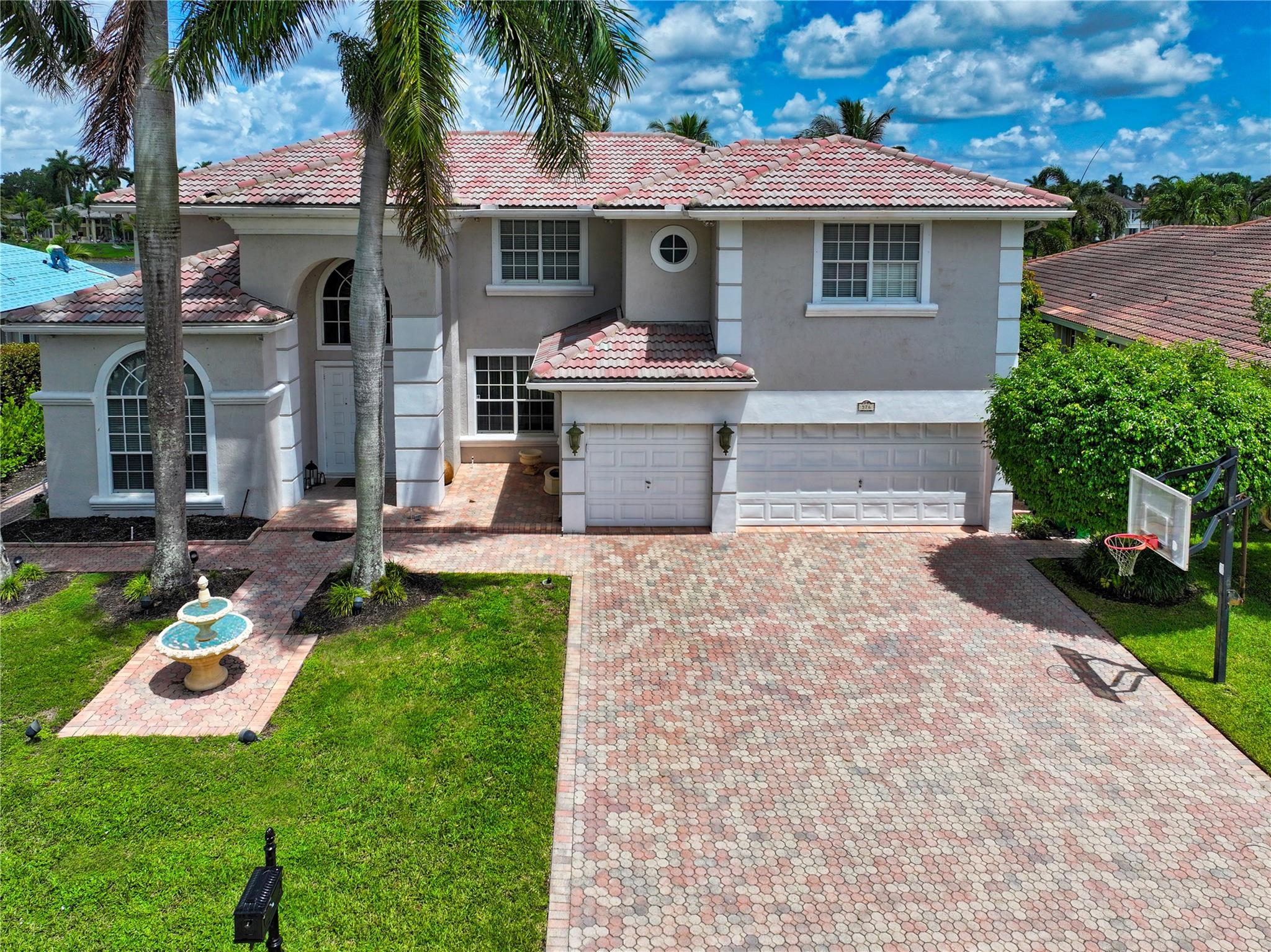 Beautiful lakefront home for rent in Coral Springs! This 5-bedroom, 4.5-bath property sits on a 16-acre lake with stunning water views from nearly every room. Enjoy high ceilings, expansive windows, and an open, light-filled layout. The home features a heated pool, spacious patio, and private dock—perfect for boating or fishing right from your backyard. Located in a gated community with access to top-rated schools. A rare opportunity to live in comfort, style, and on the water.