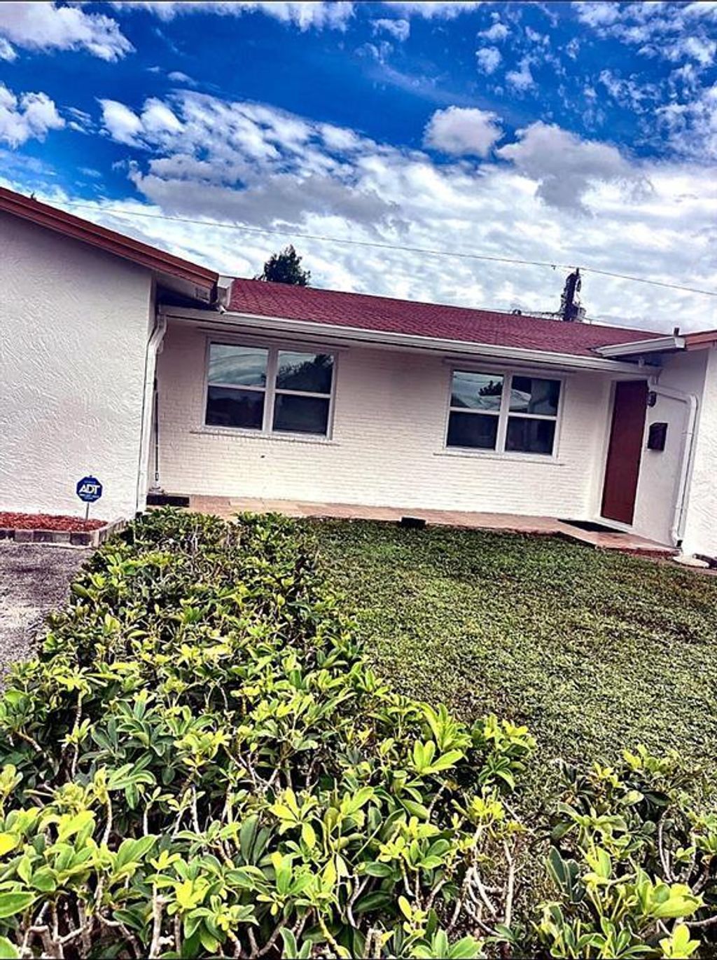 Photo of 1630 NW 52nd Avenue, Lauderhill, FL 33313 (MLS # B26022443)