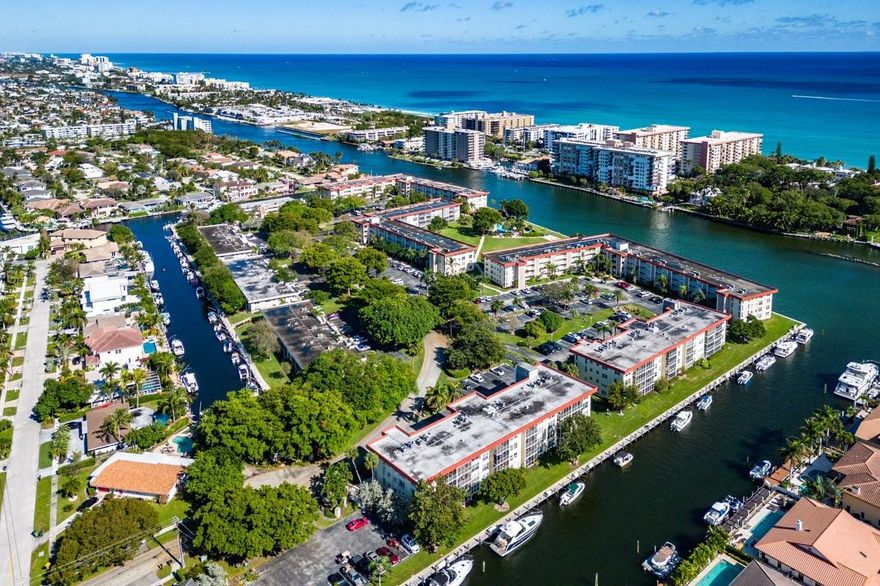Look No Further! Palm Aire in Lighthouse Point is a true hidden gem & boaters paradise! This 3 bed/2 bath corner unit is open & bright with a spacious main living area that offers impact sliders to screened porch overlooking pool/water.  Additional features include a spacious kitchen with white shaker cabinets, stainless appliances & beautiful outside views. Master bedroom with tons of closet space, great natural light & plantation shutters. Master bath has walk in shower and tons of white cabinet space. Second Bedroom is bright with plantation shutters & water views. Third bedroom is located off the living room & features French doors, Plantation shutters, water views. Third bedroom can also be used as Office/Den. All Ages welcome, Dock Space upon availability & social waterfront living!