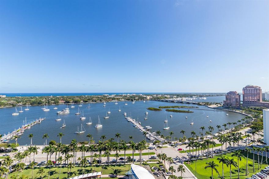 Soaring Intracoastal and Ocean views welcome you as you enter this spacious 4750+ square foot 4 bed/4.5 bath apartment in the prestigious Esplanade Grande. 1401 has a private elevator that opens into the unit with 10 ft ceilings, marble floors throughout and an ideal floor plan with an open concept kitchen and living room and a separate guest wing. Master suite features large walk- in closets, and an oversized jacuzzi bathtub. Sale includes a mounted Tonal Gym, a Peloton bike and Wi Fi extenders .Perfectly located near downtown WPB and across the bridge from the Island of Palm Beach. The building offers a 24 hour concierge, valet parking and a friendly staff to attend to your every need.  The lobby has been beautifully renovated and the building features a fitness center, jacuzzi,